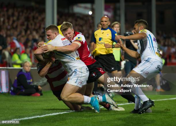 Exeter Chiefs' Sam Simmonds is tackled by Gloucester Rugby's Ollie Thorley during the Aviva Premiership match between Gloucester Rugby and Exeter...