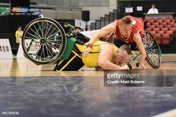 Shaun Norris of Australia and Gregg Warburton of Great Britain collide during the Wheelchair Basketball World Challenge Cup final between Australia...