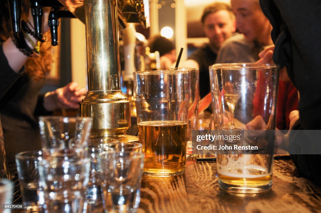 riotous drinking party in public bar