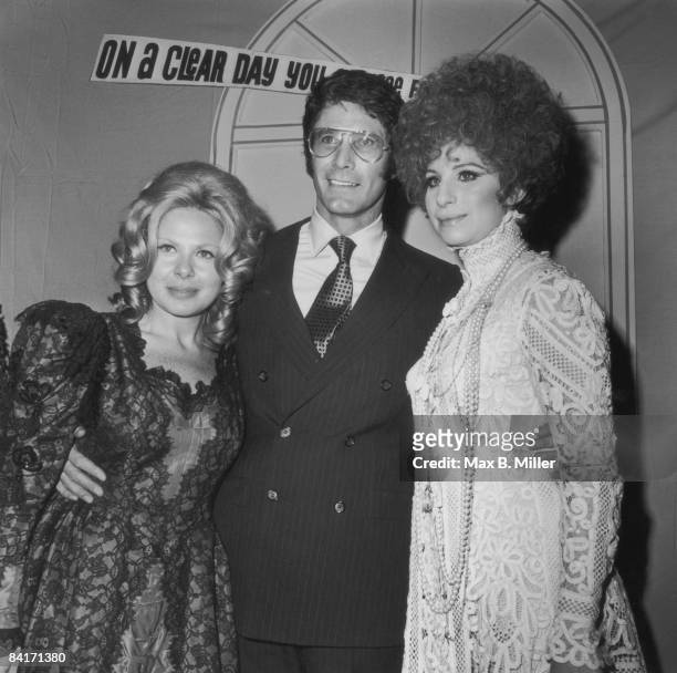 From right to left, singer Barbra Streisand, her hairdresser Fred Glaser and Hollywood agent Sue Mengers attend a Reincarnation Costume Ball at the...
