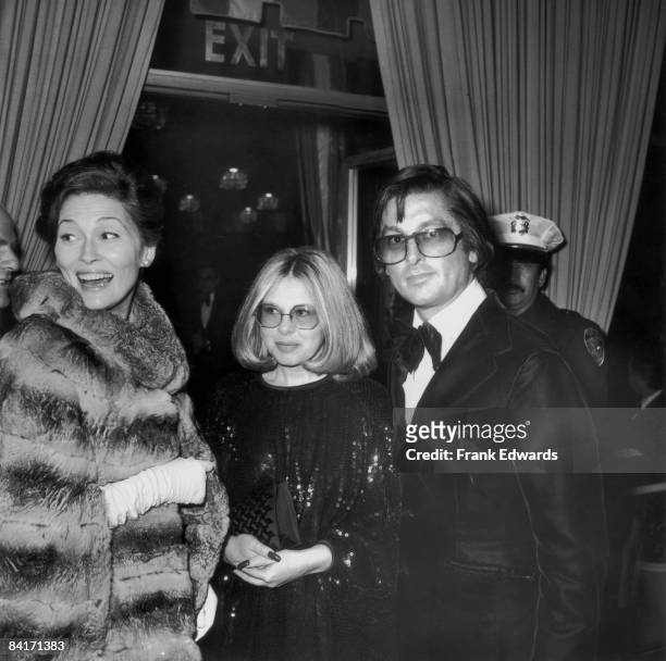 From left to right, actress Faye Dunaway, Hollywood agent Sue Mengers and producer Robert Evans attend the Golden Globe Awards at the Beverly Hilton...