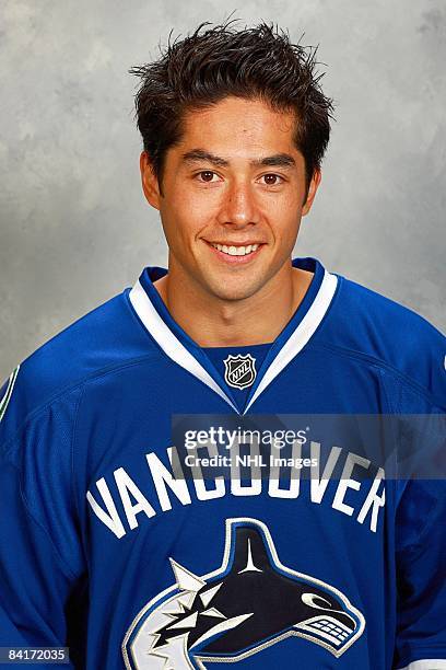 Jason Krog of the Vancouver Canucks poses for his official headshot for the 2008-2009 NHL season.