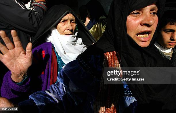 Relatives mourn the death of 20-year-old Mohamad Abo Shaar during his funeral, who was killed during an overnight Israeli airstrike on January 5,...