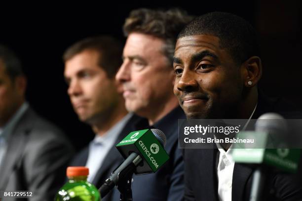 Kyrie Irving talks with the media as he gets introduced as Boston Celtics on September 1, 2017 at the TD Garden in Boston, Massachusetts. NOTE TO...