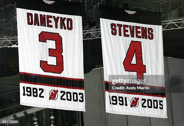 Detail view of the banners for retired New Jersey Devils Ken Daneyko and Scott Stevens in the rafters during the game against the Montreal Canadiens...