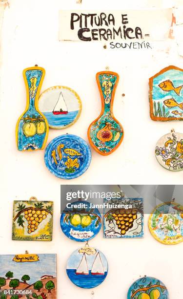 ragusa ibla, sicily, italy: ceramics hang outside tourist shop - ragusa sicily stock pictures, royalty-free photos & images