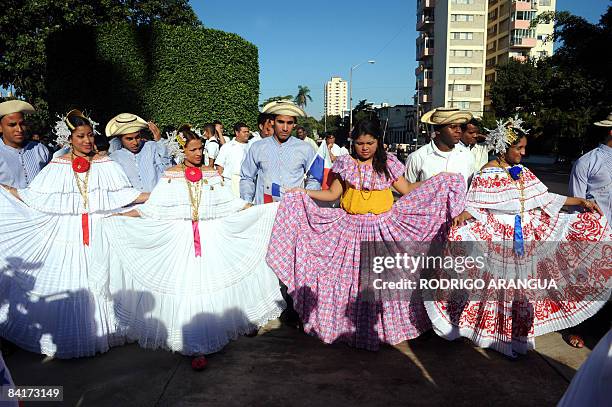 Dancers in typical Panamanian costumes perform in the inauguration of a monument to general Omar Torrijos on January 5, 2009 in Havana. Panamanian...