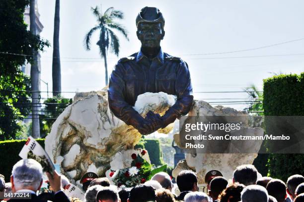 People attend a dedication ceremony for a monument of General Omar Torrijos, former President of Panama, after it was inaugurated by his son and...
