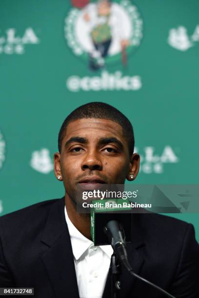 Kyrie Irving talks with the media as he gets introduced as Boston Celtics on September 1, 2017 at the TD Garden in Boston, Massachusetts. NOTE TO...