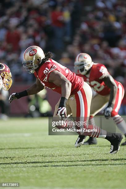 Ray McDonald of the San Francisco 49ers rushes the quarterback during the NFL game against the Washington Redskins on Bill Walsh Field at Candlestick...