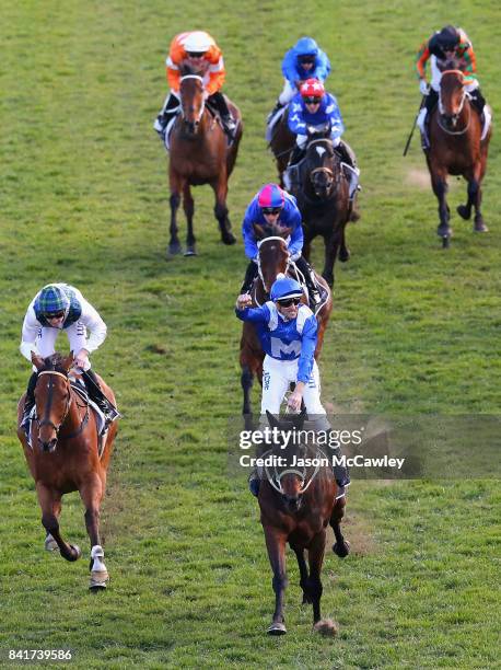 Hugh Bowman riding Winx celebrates winning Race 7 in the Tattersalls Club Chelmsford Stakes at Royal Randwick Racecourse on September 2, 2017 in...