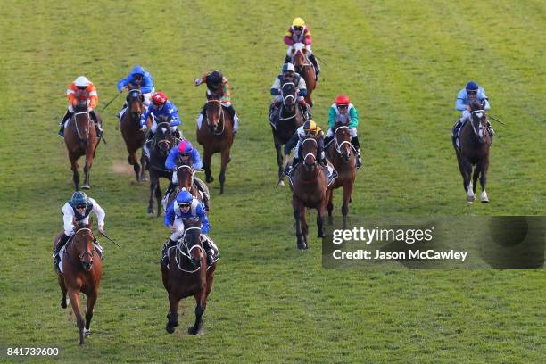 Hugh Bowman riding Winx celebrates winning Race 7 in the Tattersalls Club Chelmsford Stakes at Royal Randwick Racecourse on September 2, 2017 in...