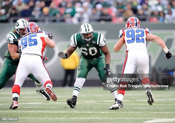 Offensive tackle D'Brickashaw Ferguson of the New York Jets blocks against the Buffalo Bills on December 14, 2008 at Giants Stadium in East...
