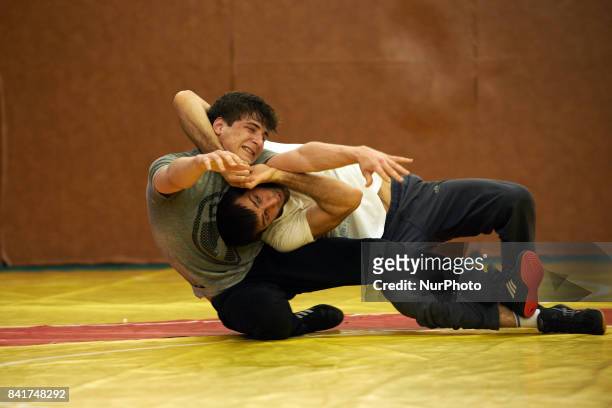 Islam and an another member of the TOAC Wrestling Club fight each other during a training. On 1st September 2017 in Toulouse, France.