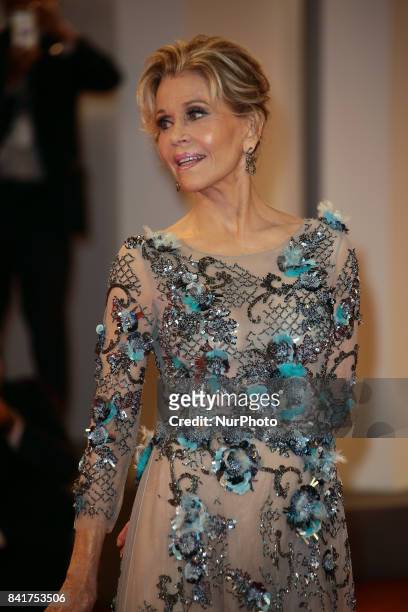Jane Fonda walk the red carpet ahead of the 'Our Souls At Night' screening during the 74th Venice Film Festival in Venice, Italy, on September 1,...