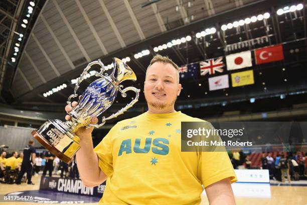 Shaun Norris of Australia poses with the winner trophy after the Wheelchair Basketball World Challenge Cup final between Australia and Great Britain...