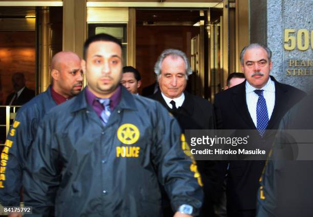 Bernard Madoff walks out from Federal Court after a bail hearing in Manhattan January 5, 2009 in New York City. Madoff is accused of running a $50...