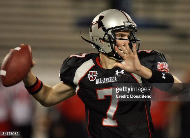Quarterback Garrett Gilbert of the black team throws a pass in the All America Under Armour Football Game at Florida Citrus Bowl on January 4, 2009...