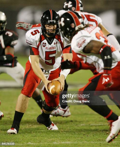 Matt Barkley of the white team pitches the ball back to wide receiver Logan Heastie during the All America Under Armour Football Game at Florida...