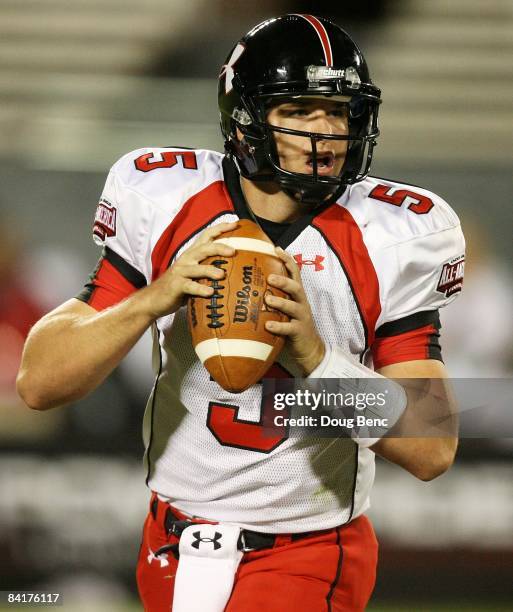 Matt Barkley of the white team drops back to pass during the All America Under Armour Football Game at Florida Citrus Bowl on January 4, 2009 in...