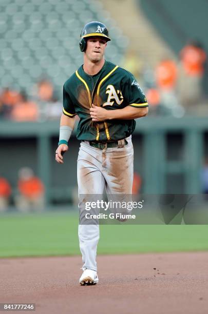 Boog Powell of the Oakland Athletics runs the bases against the Baltimore Orioles at Oriole Park at Camden Yards on August 22, 2017 in Baltimore,...