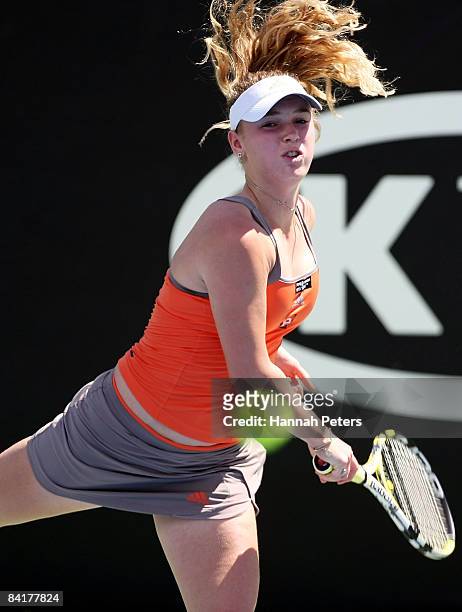 Caroline Wozniacki of Denmark serves in her match against Alberta Brianti of Italy during day two of the ASB Classic at ASB Tennis Centre on January...