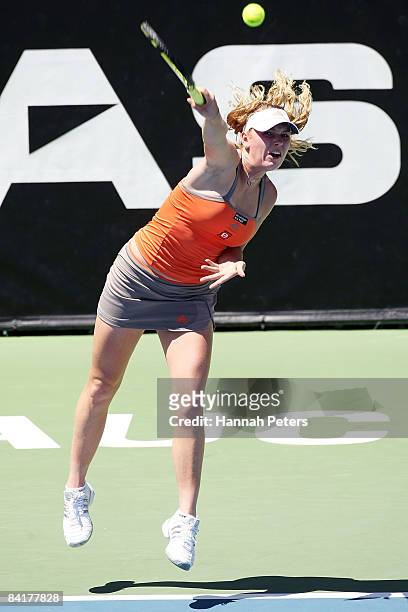 Caroline Wozniacki of Denmark serves in her match against Alberta Brianti of Italy during day two of the ASB Classic at ASB Tennis Centre on January...