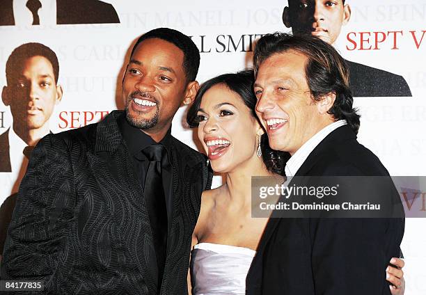 Actors Will Smith and Rosario Dawson pose with director Gabriele Muccino at the Paris Photocall of Seven Pounds at the Gaumont Champs-Elysees on...