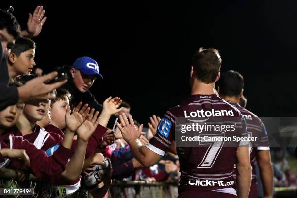 Daly Cherry-Evans of the Sea Eagles thanks fans after winningthe round 26 NRL match between the Manly Sea Eagles and the Penrith Panthers at...