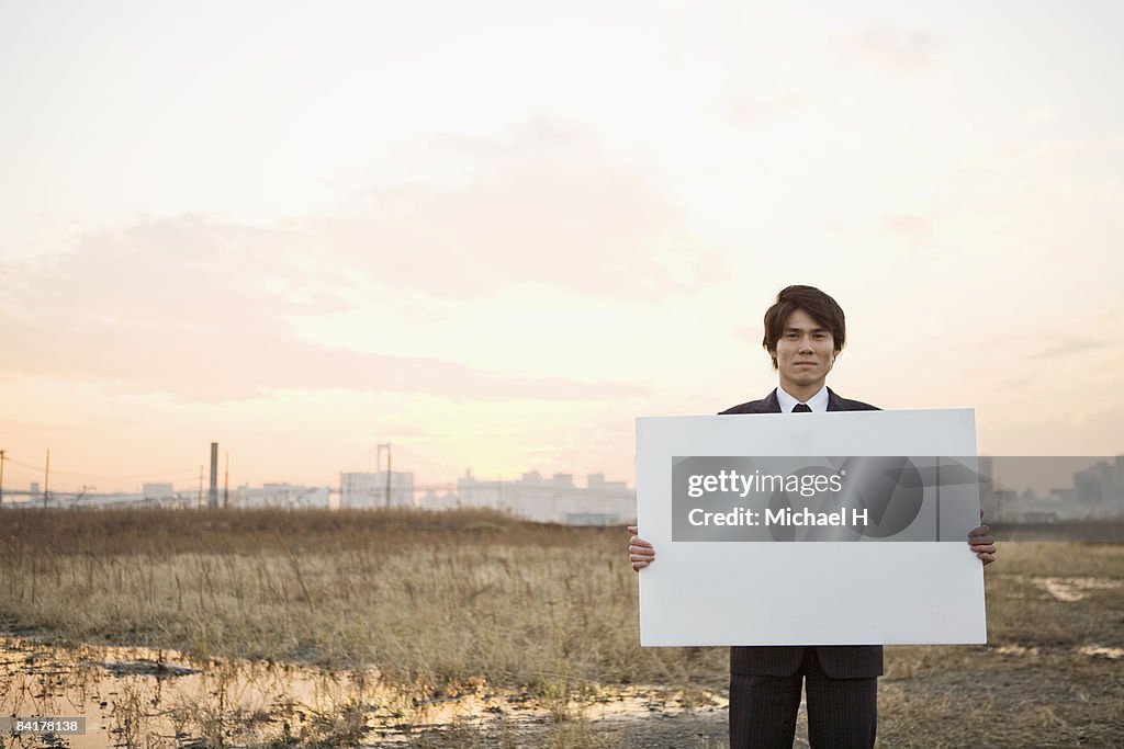 A businessman with the message board