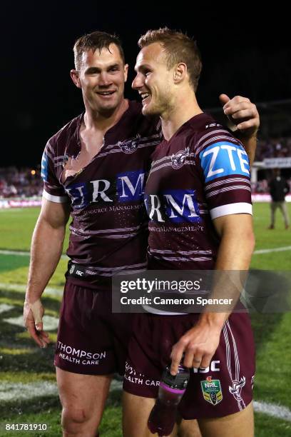 Brenton Lawrence of the Sea Eagles embraces team mate Daly Cherry-Evans after winning the round 26 NRL match between the Manly Sea Eagles and the...