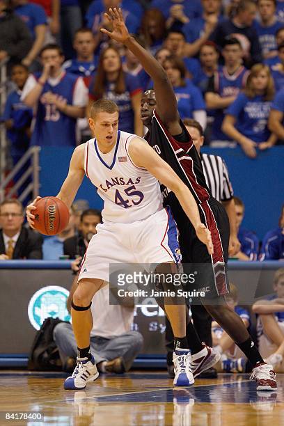 Cole Aldrich of the Kansas Jayhawks moves for the basket during the game against the New Mexico State Aggies on December 3, 2008 at Allen Fieldhouse...