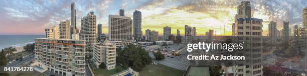 surfers paradise skyline at sunset - gold coast skyline stock pictures, royalty-free photos & images