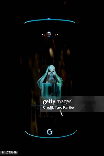 Hologram virtual home robot called 'Living With Hatsune Miku' developed by Gatebox is displayed during the 'Magical Mirai 2017' at Makuhari Messe on...