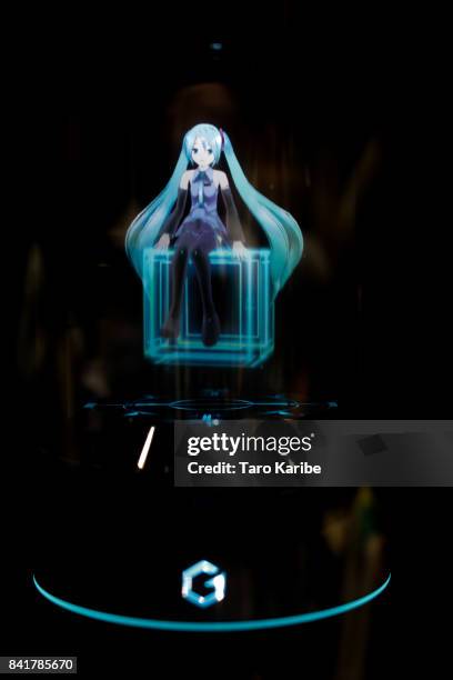 Hologram virtual home robot called 'Living With Hatsune Miku' developed by Gatebox is displayed during the 'Magical Mirai 2017' at Makuhari Messe on...