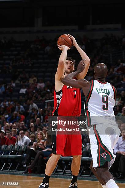 Andrea Bargnani of the Toronto Raptors shoots a jumpshot against Francisco Elson of the Milwaukee Bucks on January 5, 2009 at the Bradley Center in...