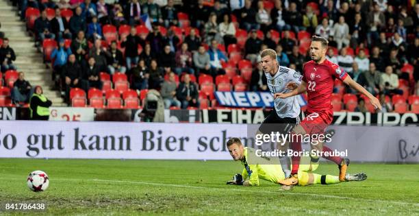 Timo Werner of Germany scores his team's first goal against goalkeeper Tomas Vaclik of Czech Republic during the FIFA 2018 World Cup Qualifier...