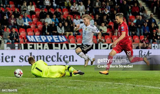 Timo Werner of Germany scores his team's first goal against goalkeeper Tomas Vaclik of Czech Republic during the FIFA 2018 World Cup Qualifier...