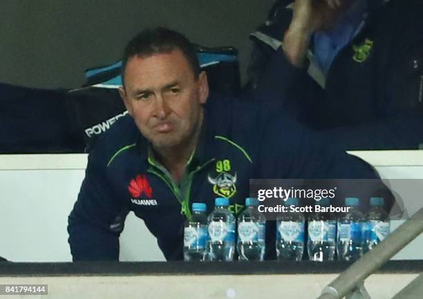 Raiders coach Ricky Stuart reacts in the coaches box during the round 26 NRL match between the Melbourne Storm and the Canberra Raiders at AAMI Park...