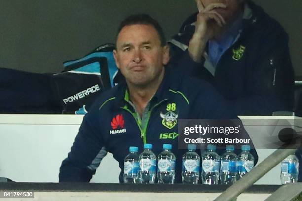 Raiders coach Ricky Stuart reacts in the coaches box during the round 26 NRL match between the Melbourne Storm and the Canberra Raiders at AAMI Park...