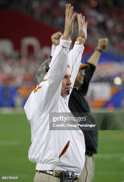 Head coach Mack Brown of the Texas Longhorns celebrates after the Longhorns scored a third quarter touchdown against the Ohio State Buckeyes during...