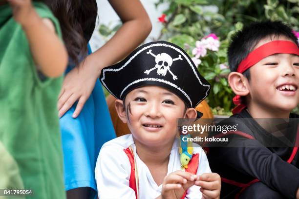 boy's closeup face. - ninja kid stock pictures, royalty-free photos & images