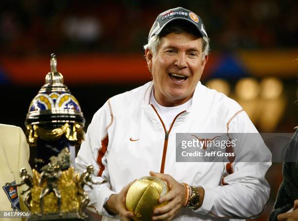 Head coach Mack Brown of the Texas Longhorns celebrates after defeating the Ohio State Buckeyes in the Tostitos Fiesta Bowl Game on January 5, 2009...
