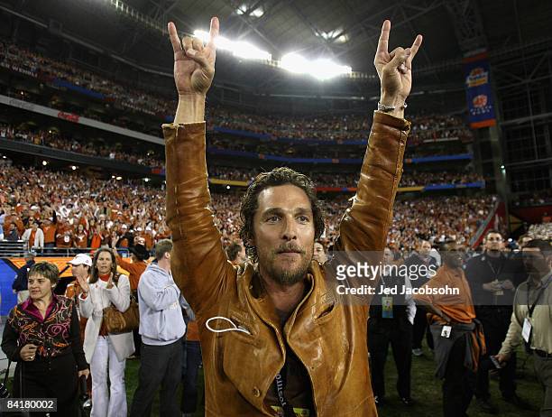 Actor Matthew McConaughey celebrates after the Texas Longhorns defeated the Ohio State Buckeyes in Tostitos Fiesta Bowl Game on January 5, 2009 at...