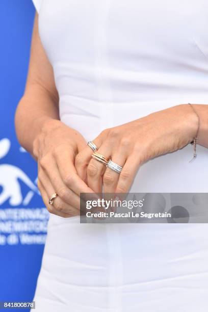 Anita Caprioli, jewel detail, attends the 'Diva!' photocall during the 74th Venice Film Festival on September 2, 2017 in Venice, Italy.