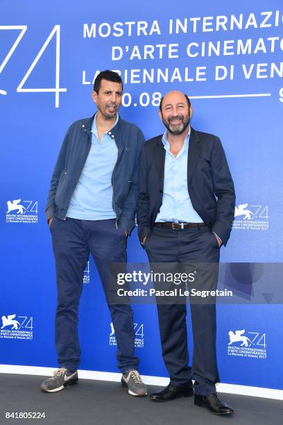 Samir Guesmi and Kad Merad attend the 'La Melodie' photocall during the 74th Venice Film Festival on September 2, 2017 in Venice, Italy.