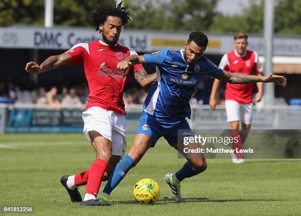 Callum McNish of Didcot Town and Jermaine Pennant of Billericay Town challenge for the ball during The Emirates FA Cup Qualifying First Round match...