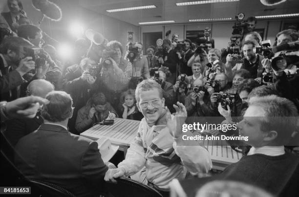 Ski jumper Eddie 'The Eagle' Edwards arrives at London Airport after failing spectacularly in the Winter Olympics ski-jumping competition, 2nd March...