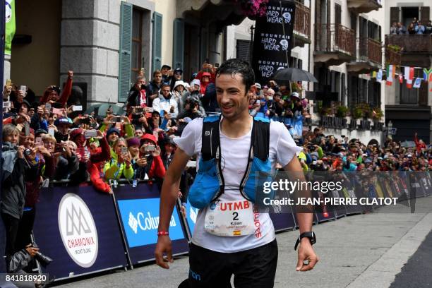 Second-placed Spanish athlete and former Mount Blanc Ultra Trail winner, Kilian Jornet, runs towards the finish line of the 15th edition of the UTMB,...