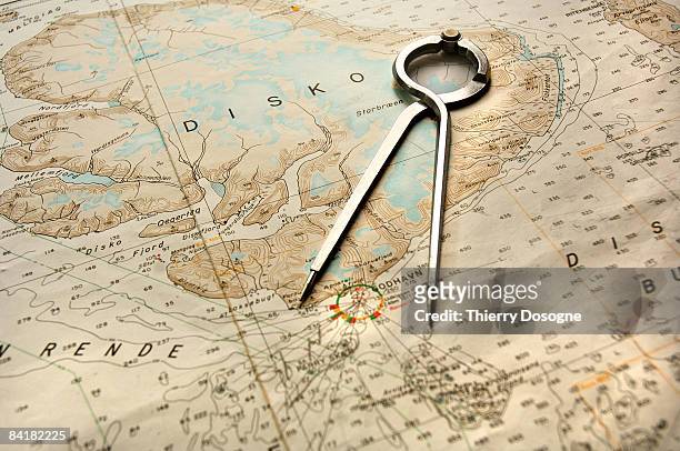 compass on nautical chart  - drawing compass stock pictures, royalty-free photos & images